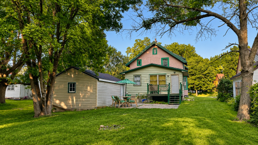 enjoy the spacious backyard, patio, and deck