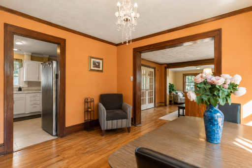 Spacious dining room with natural woodwork throughout.PNG