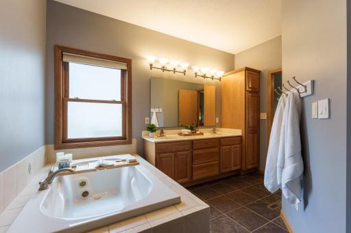 En-suite full bathroom. Check out that cabinet space!