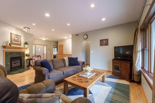 Designed for easy main-level living, the main floor features the kitchen, dining and living room with gas fireplace, a spacious primary suite with large private bathroom, second bedroom and full bath, and dedicated laundry room.
