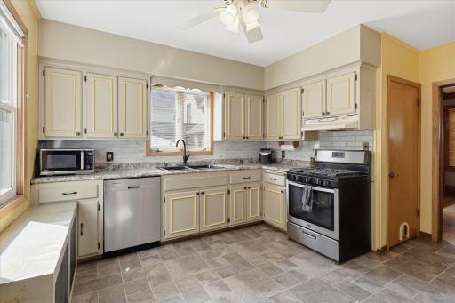 For an older home, the kitchen is spacious enough for more than one cook, nicely detailed with abundant cabinetry and stainless steel appliances.