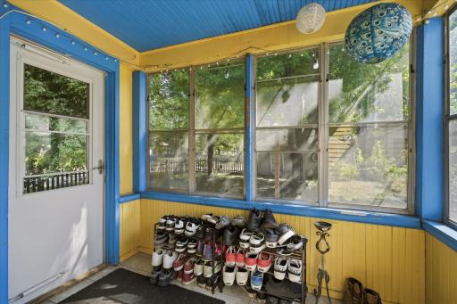 Great little mudroom off the back of home with new exterior and screen doors.