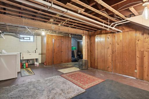 Downstairs offers space to add a family room or playroom.