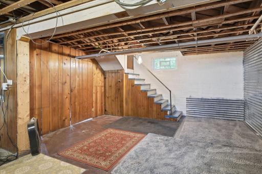 Room for a ping-pong table or some type of game room would be fun down here!
