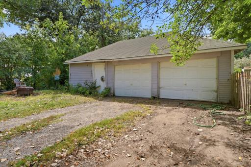 Two-stall detached garage also includes a shop area for conveniently working on projects.