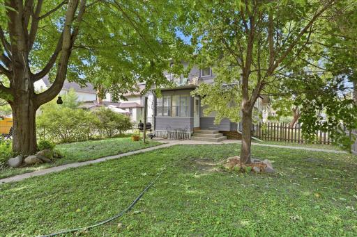 Nicely shaded backyard with lots of space between home and garage.