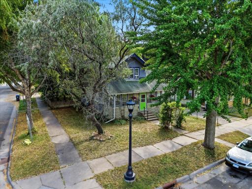 Corner lot with light post just adds to the cuteness of this Craftsman home.