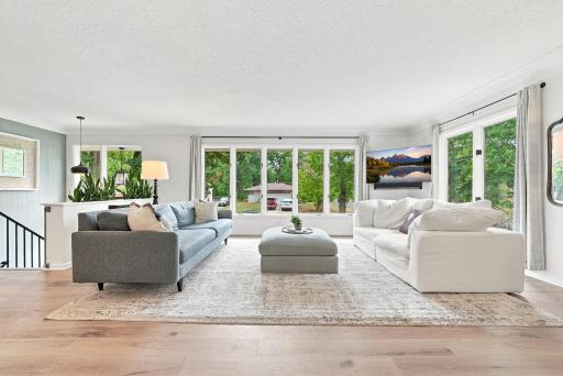 Large open floor plan on main level with tons of natural lighting