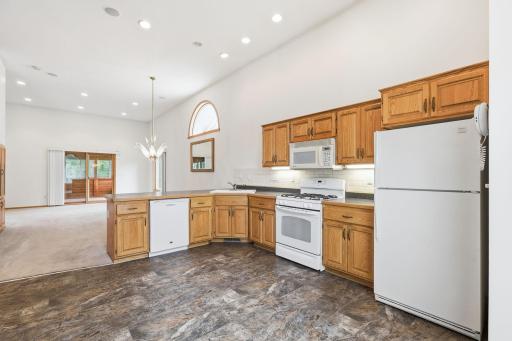 Kitchen with breakfast bar and corner sink