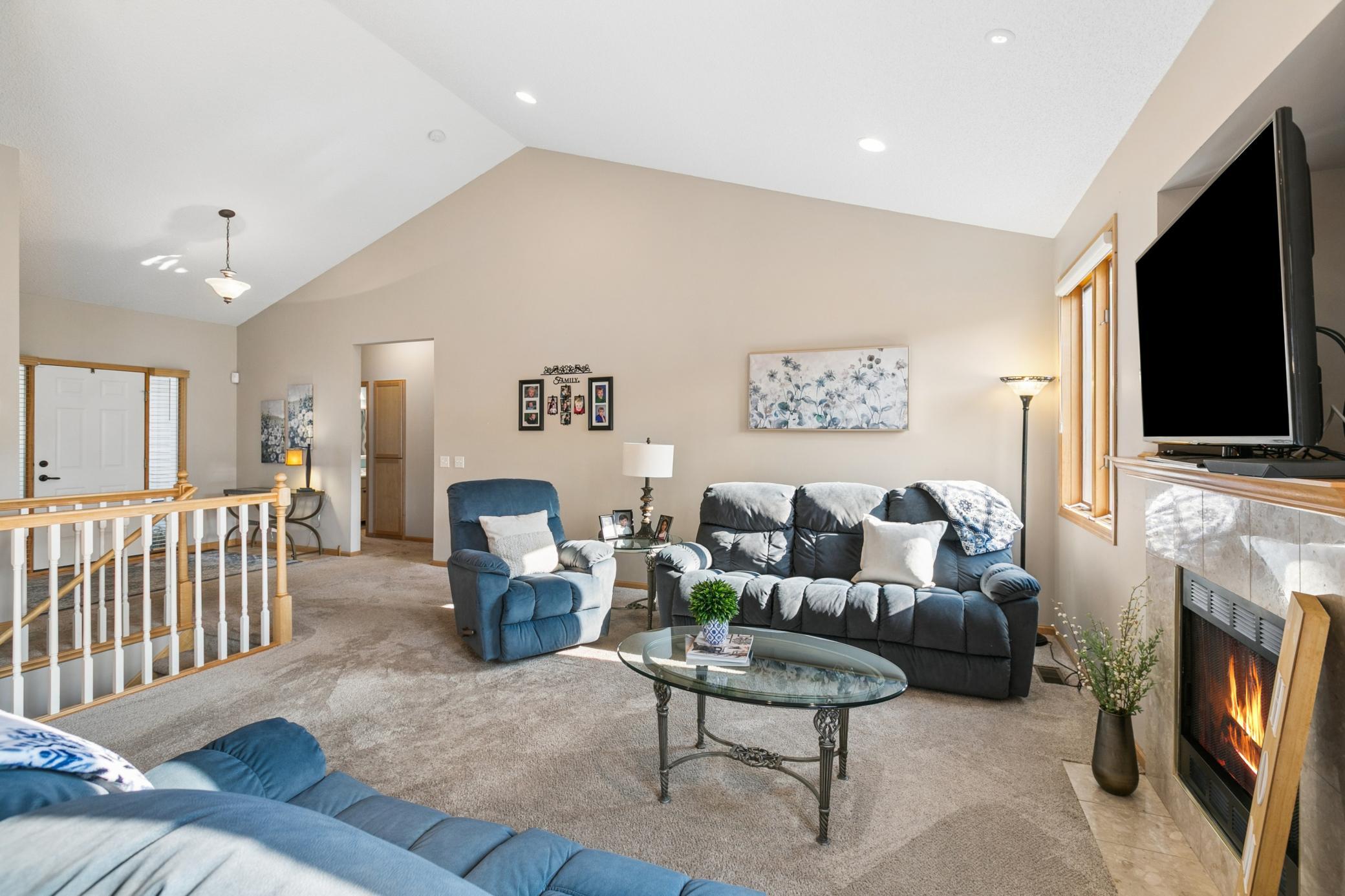 Gather in this generously-sized, open living room, again, with southern exposure and warm glow of that afternoon sun.