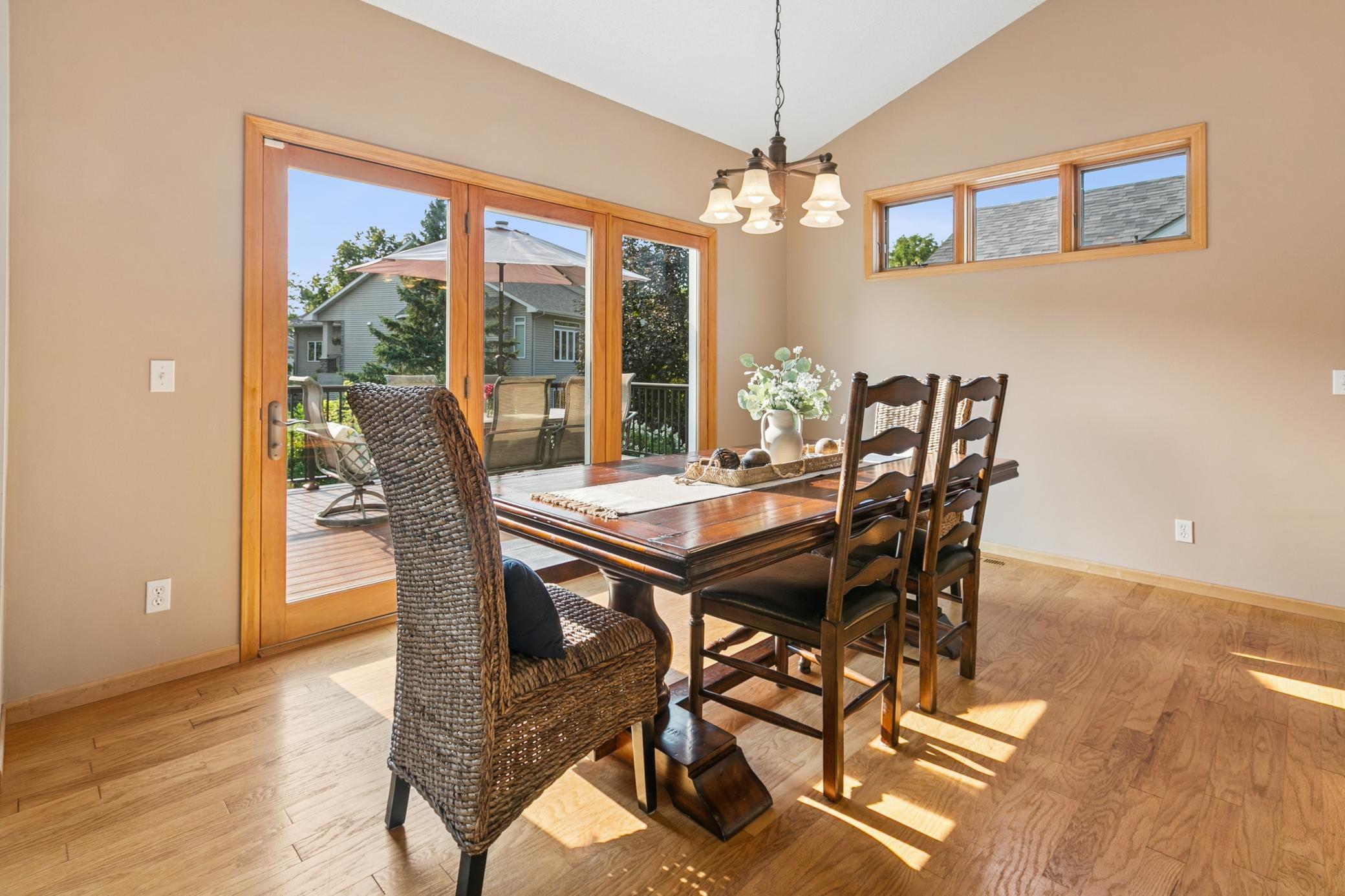 Enjoy the warmth of the natural light through the expansive deck doors and transom windows. A great place to gather for family and holiday meals. New deck door.