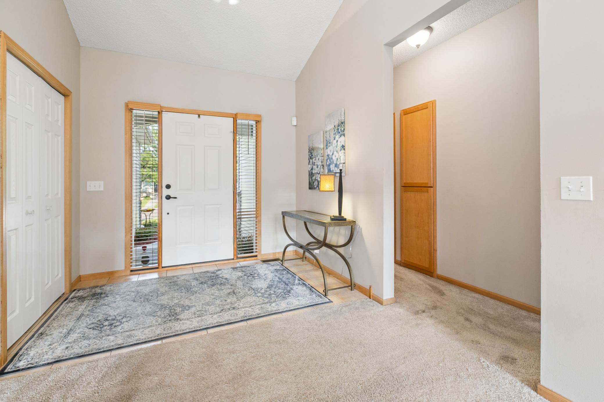 Welcome guest through your front entrance and open foyer with coat closet. Lots of natural light streams into the space.
