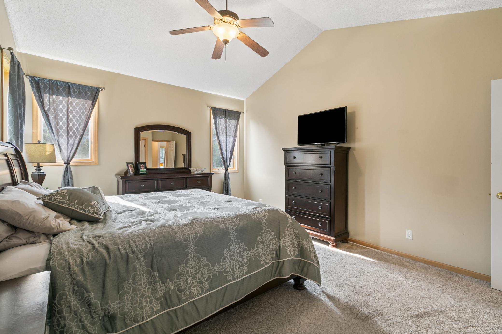 Warm finishes and natural sunlight creates a cozy sanctuary.