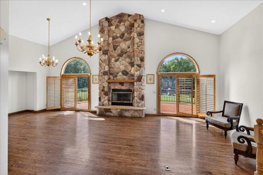 Be wows by views of the massive stone fireplace and open layout as you enter the main floor living spaces.