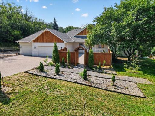 View of the stunning paver driveway added in 2025/26 for $25,000. Welcome Home!