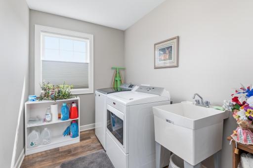 The bright, clean second floor laundry room is right were you want it, with a full size washer and dryer plus laundry tub.