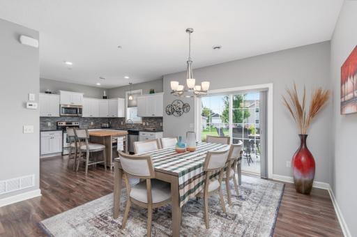 A sliding door steps out to the patio where you can relax with friends and family. Or grill dinner tonight!
