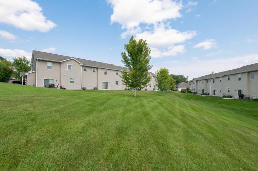There is a wonderful greenspace behind the home. Great for throwing a ball with kids or a pet!