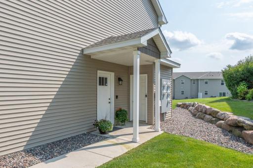 Welcome home and step inside to the main level. The end unit has a private side entrance. You will appreciate the sunny southwest exposure.