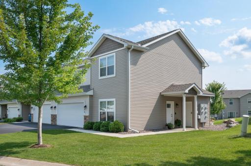 Original owners have maintained this home to perfection! Desirable end unit townhome with a nice little grassy area off the front door!