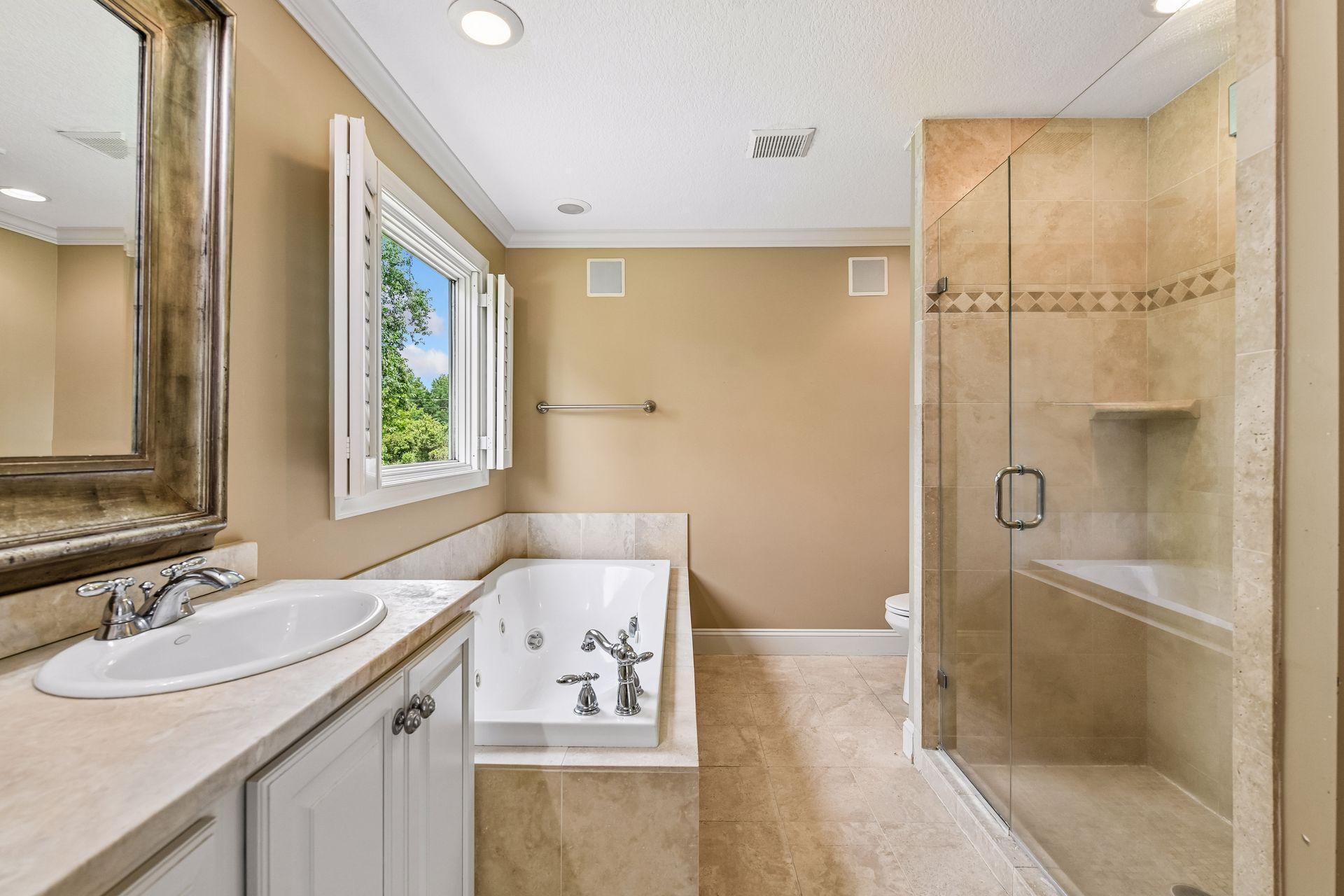 Separate jetted tub and shower