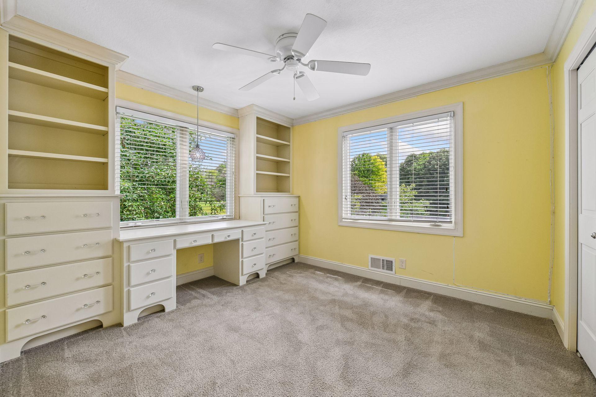 Upper-level Bedroom 3 with built-ins
