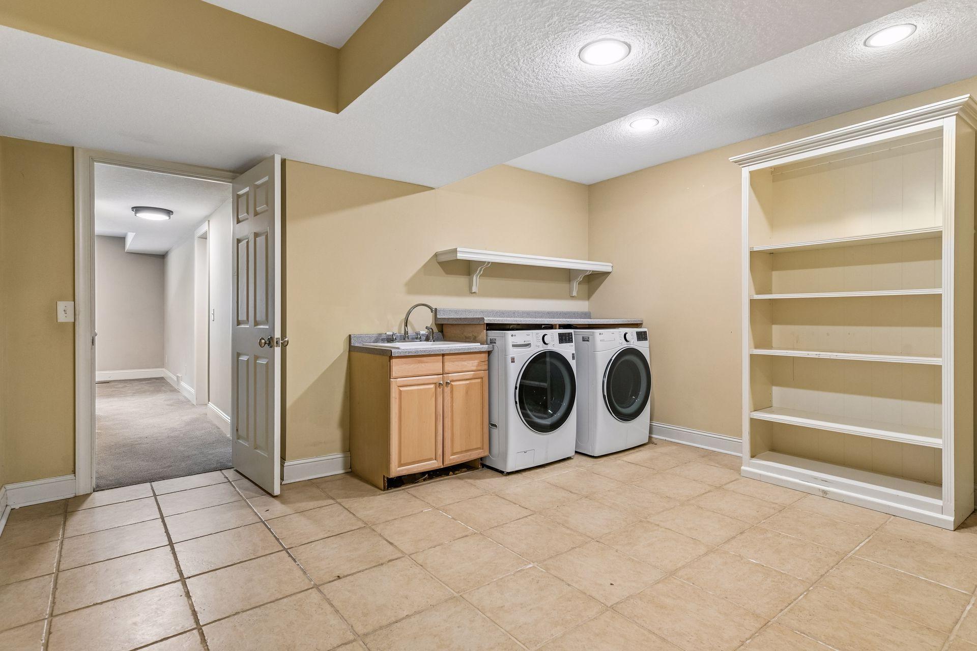 Large Laundry room with plenty of storage
