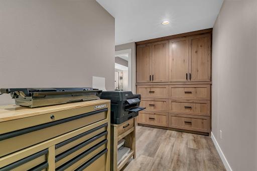 An additional space just off the office offers flexible room for extra storage, work equipment, or whatever fits your needs.
