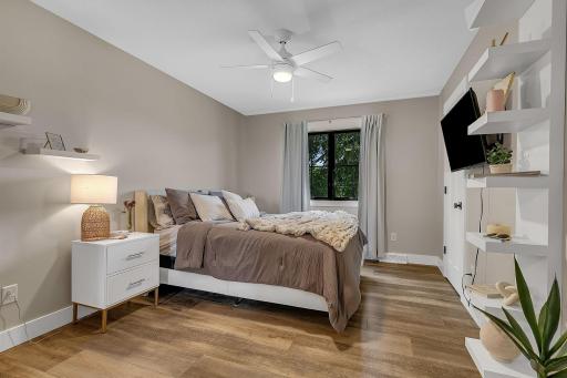 Hereâs a look at the second upstairs bedroomâa comfortable space with plenty of room to relax and make your own.