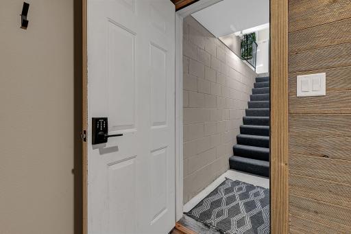 A convenient staircase connects the lower level directly to the garage, providing easy access and added functionality for everyday living.