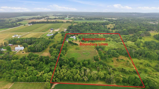 Situated on 20 acres of beautiful, diverse landscape featuring manicured grounds, wooded areas, natural grasslands, and river frontage, all within the highly regarded Sartell School District.