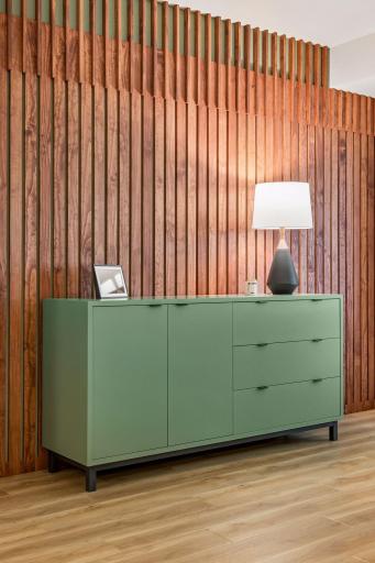 Custom wood paneled wall adding architectural interest.