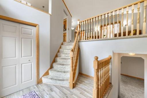 Front Entryway with Closet & Beautiful Oak Spindles