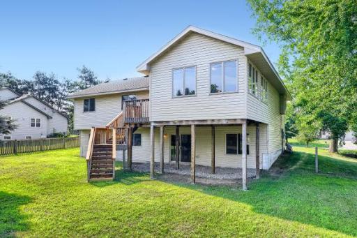 Back Photo of Large Home & Porch