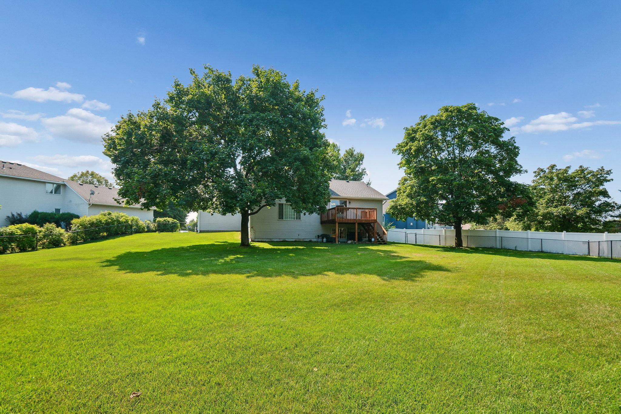 The fenced in backyard sits on a .51 acre lot.