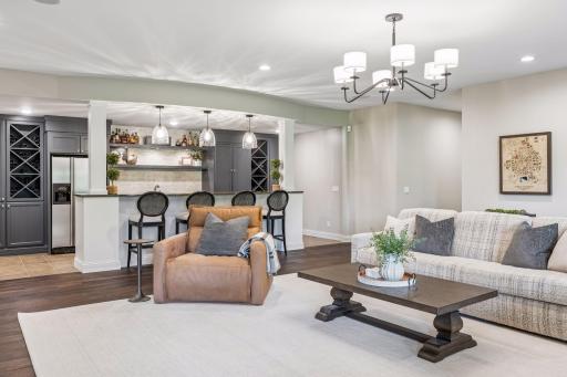The lower level features an updated bar right off the family roomâgreat for hosting gatherings and enjoying time with friends.