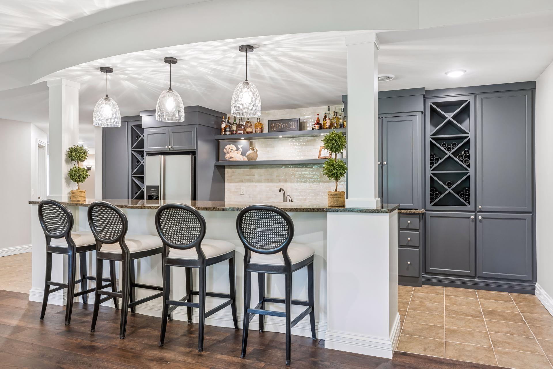 An updated bar area offers impressive amenities, including wine storage, a full-size refrigerator, dishwasher, and microwave—perfect for effortless entertaining.
