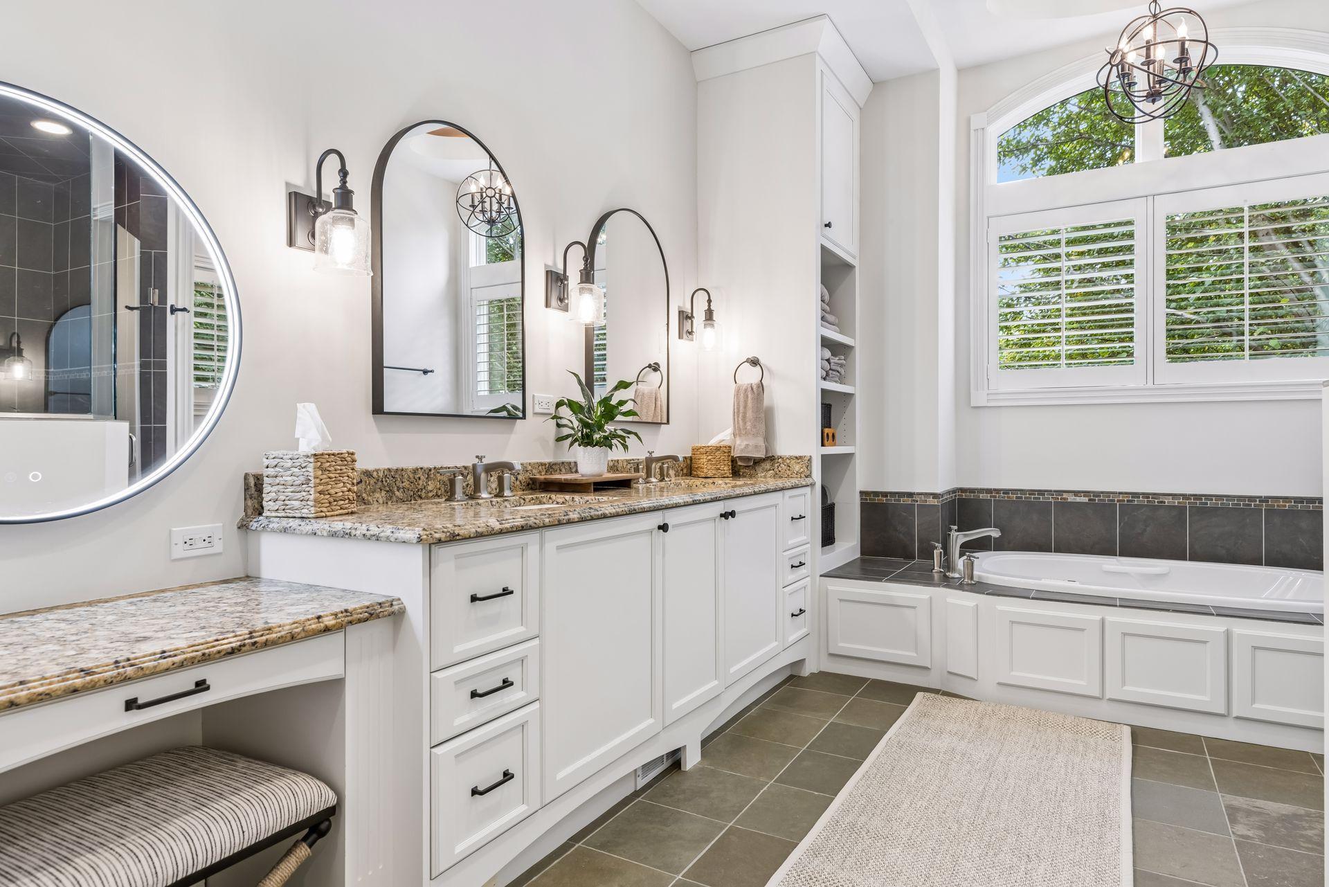 A beautifully designed make-up vanity enhances the primary bathroom, offering a comfortable and convenient space for getting ready.