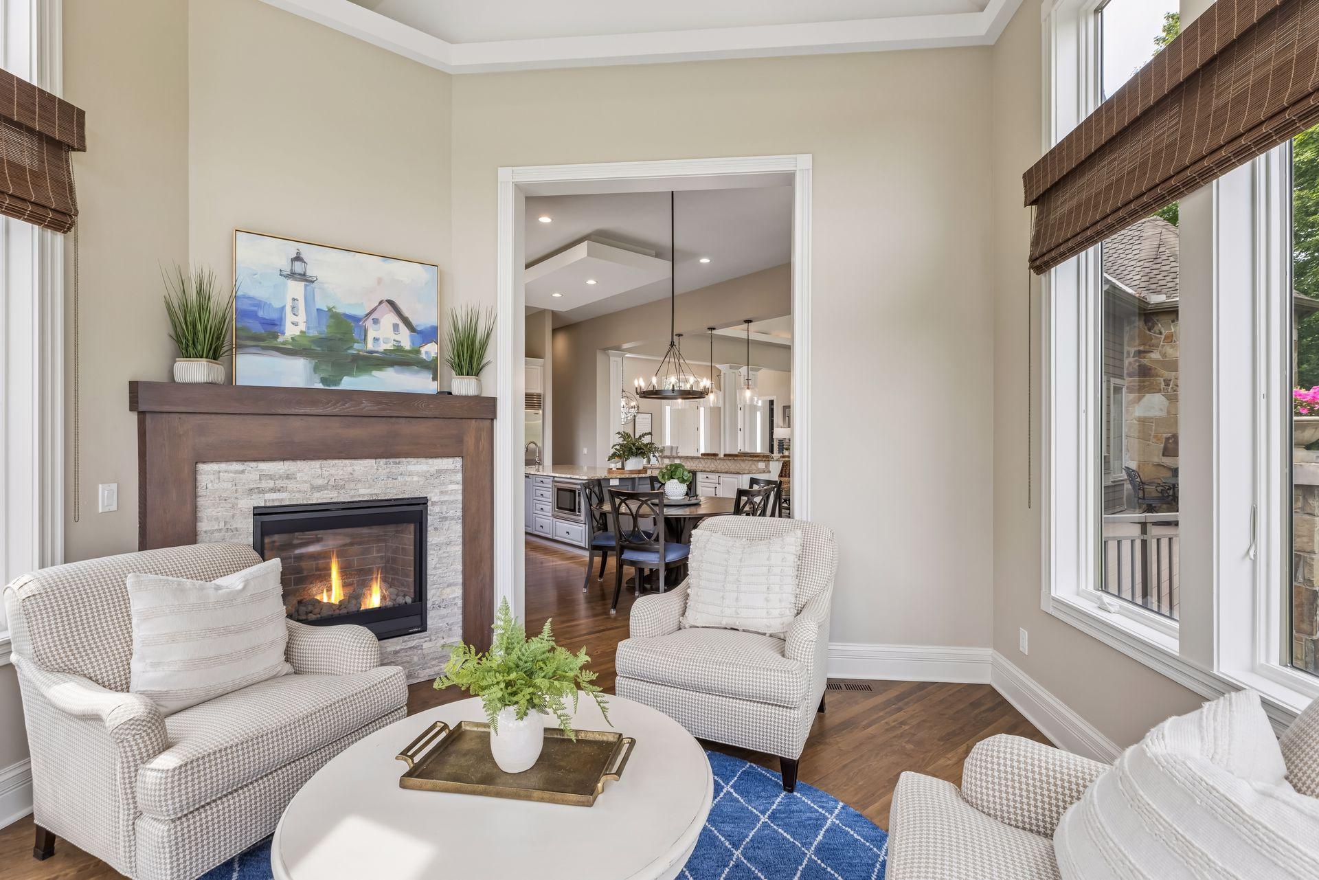 The four-season porch features a cozy gas fireplace for year-round comfort.