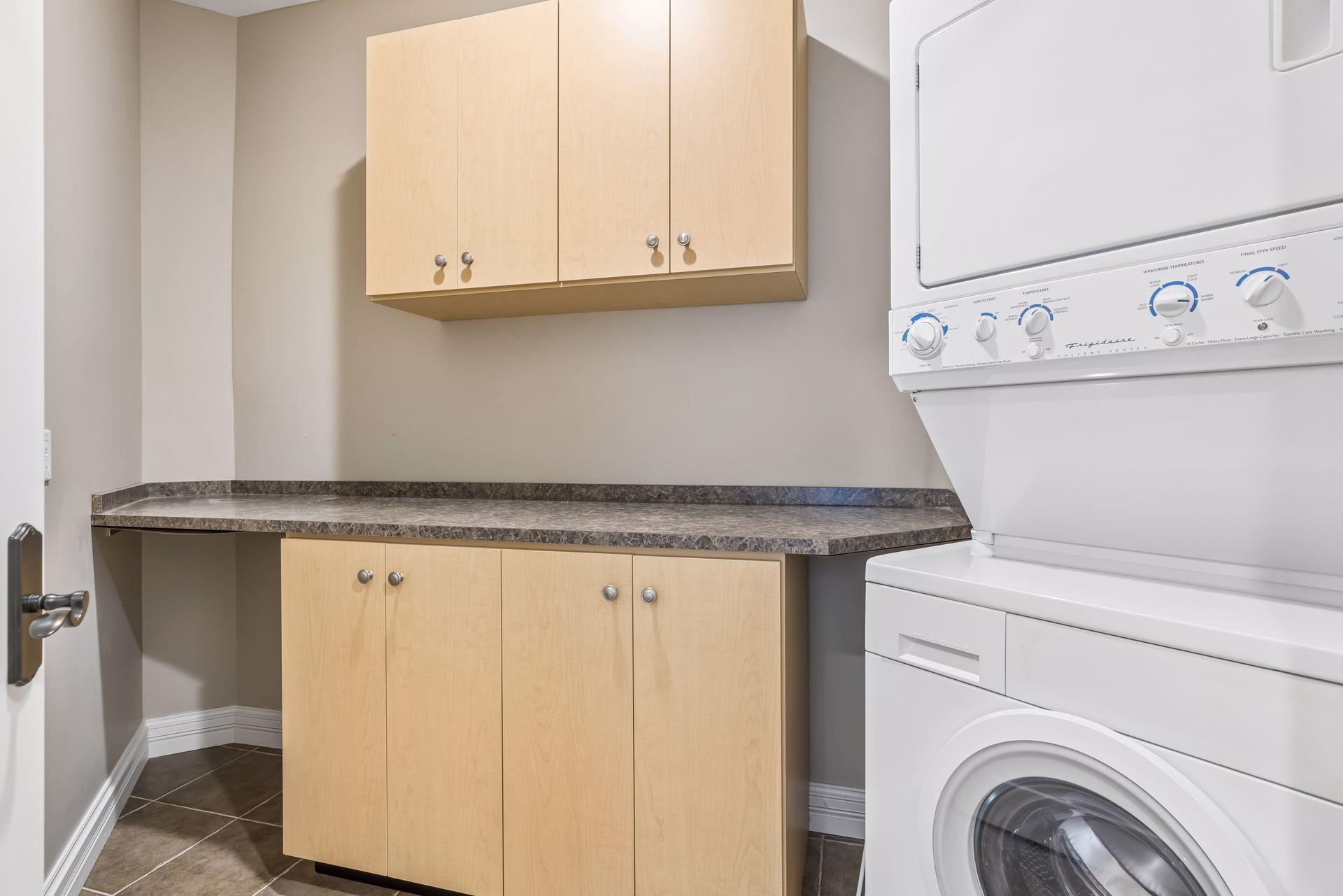 The lower level includes an extra laundry room—perfect for busy households and easy everyday living.