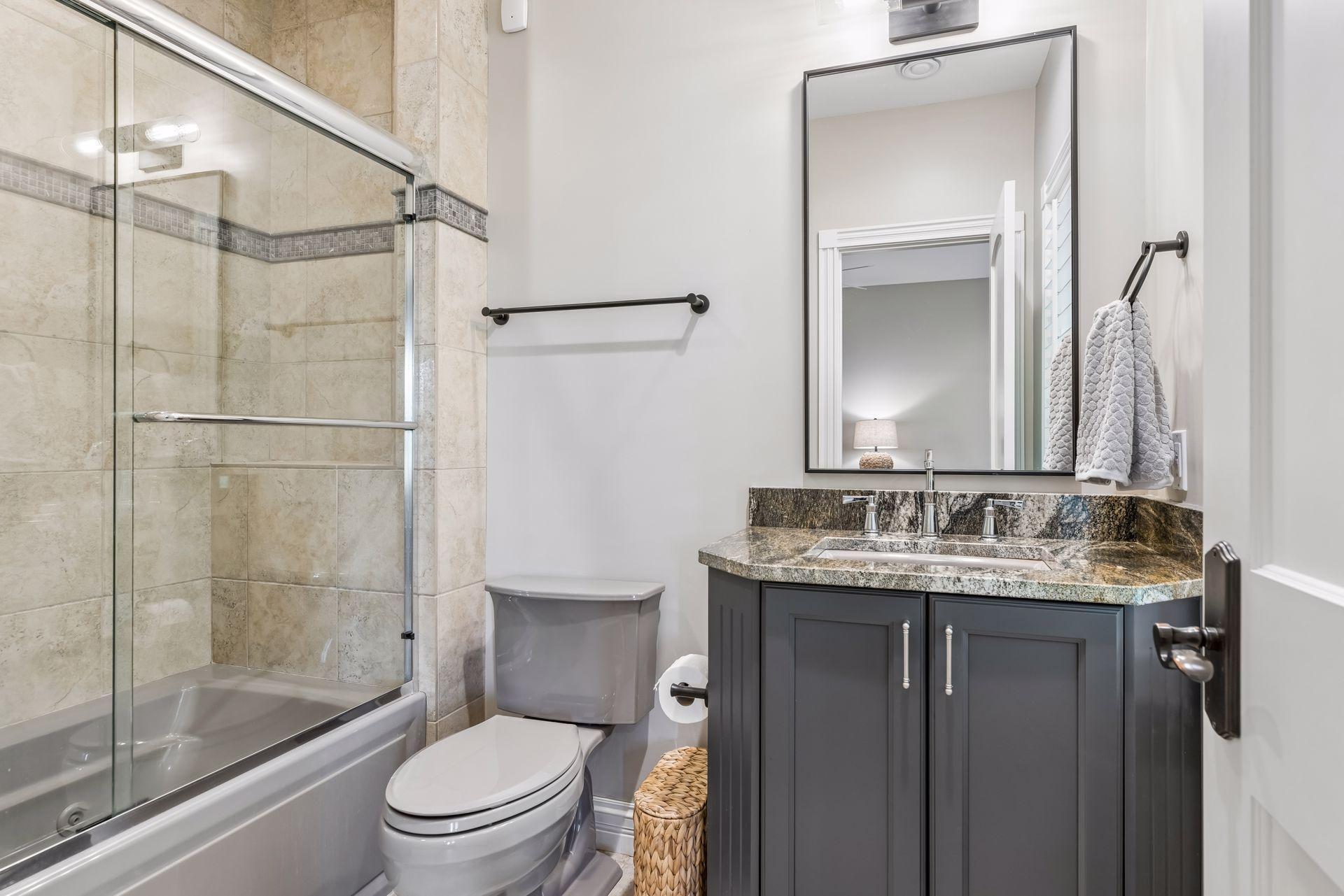 A full bathroom connects to Bedroom 3 and features an updated vanity.