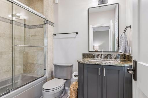 A full bathroom connects to Bedroom 3 and features an updated vanity.