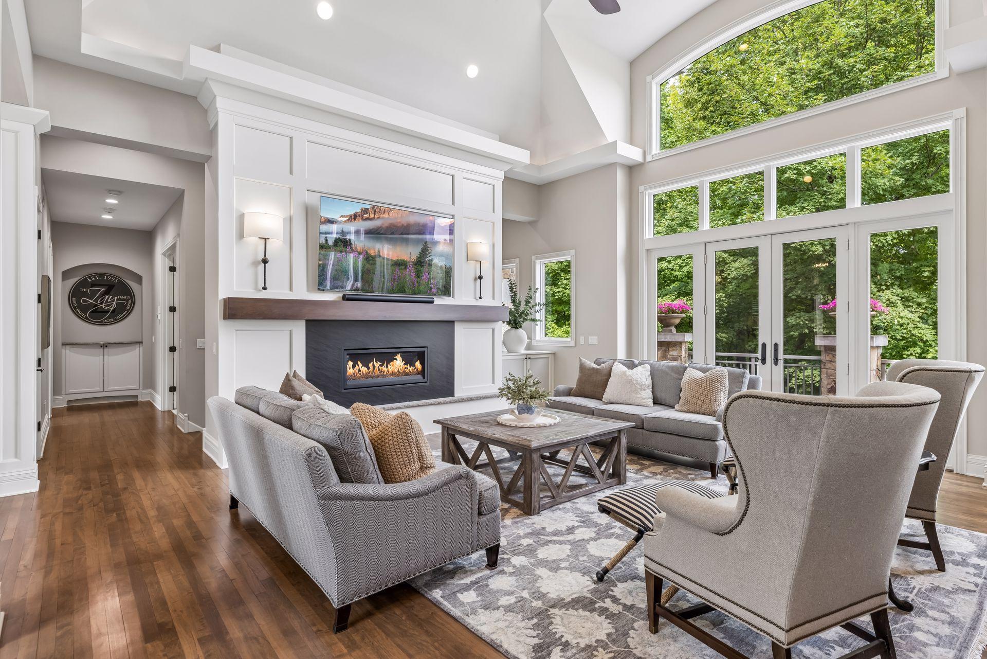 Main floor features a large great room with a stunning updated gas fireplace.