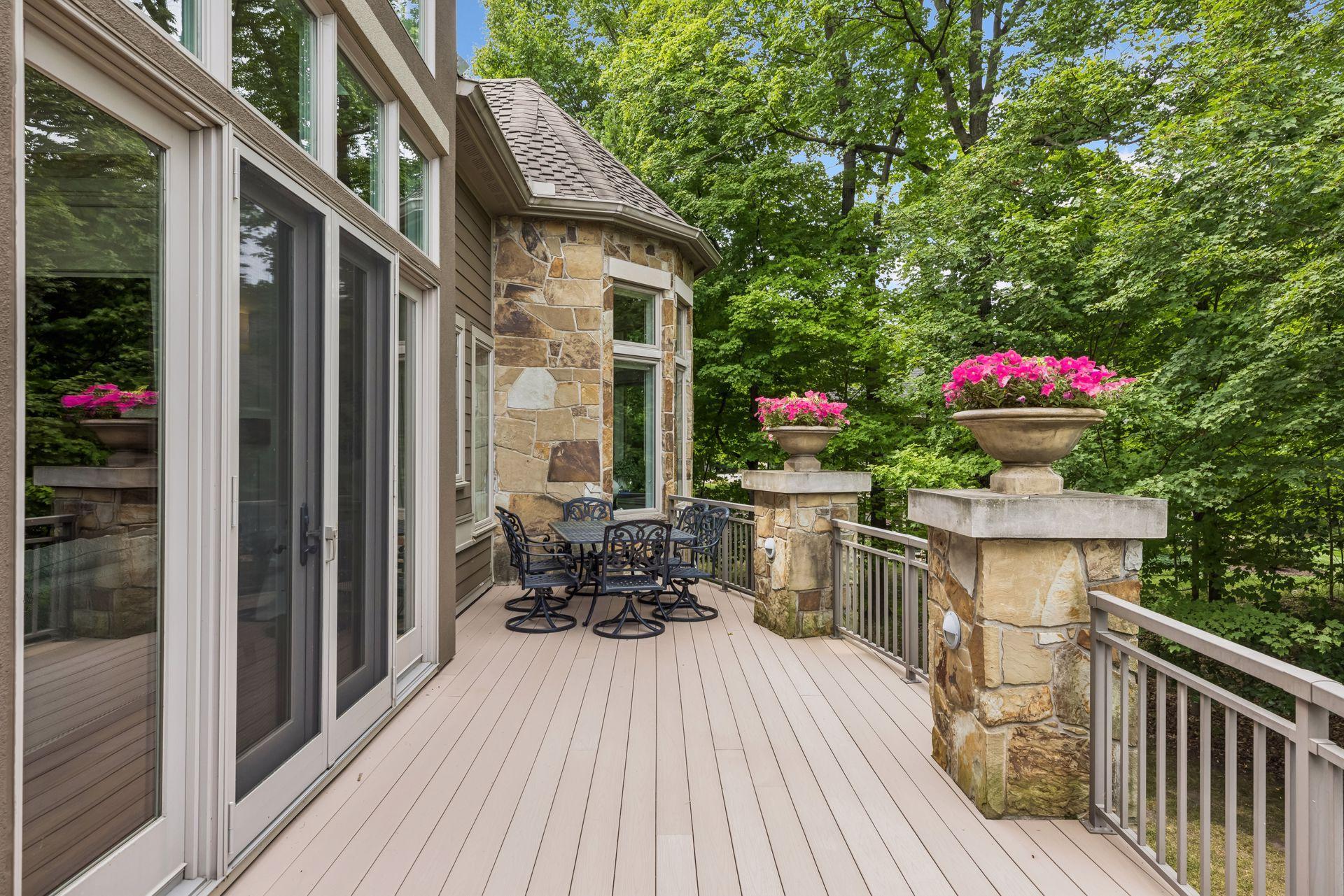 A large deck extends off the main living area, offering seamless indoor-outdoor living.