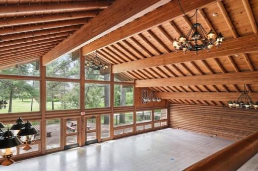 Beautiful wood work, huge windows out to majestic mature trees