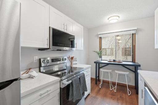 Breakfast bar area in addition to the informal dining space
