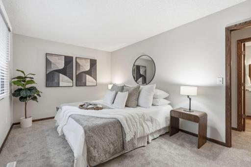 Spacious primary bedroom with King bed