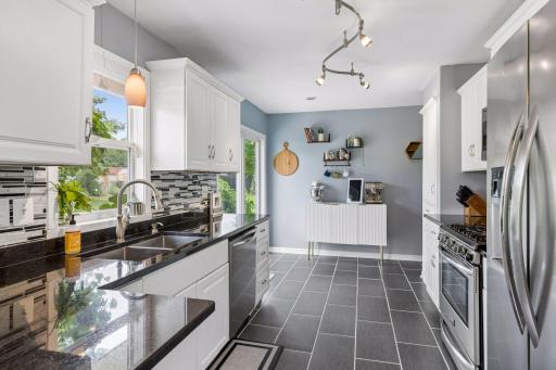 Fabulous kitchen with granite, stainless appliances and plenty of cabinetry