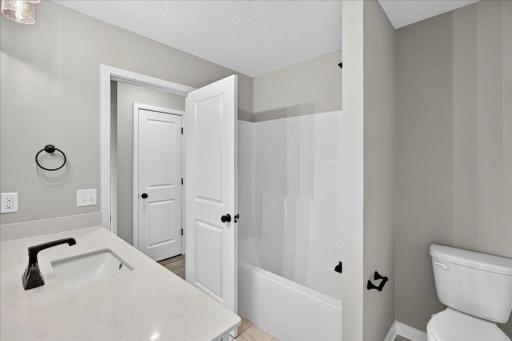 Photo taken of another home with similar plan and finishes.