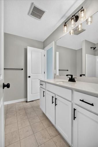 Photo taken of another home with similar plan and finishes.